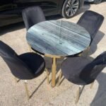 GREY WOODEN EFFECT ROUND TABLE GOLD LEG