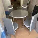 GREY AND WHITE ROUND TABLE with Grey and White Chair