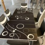 BLACK BUBBLE DINING TABLE AND CHAIRS